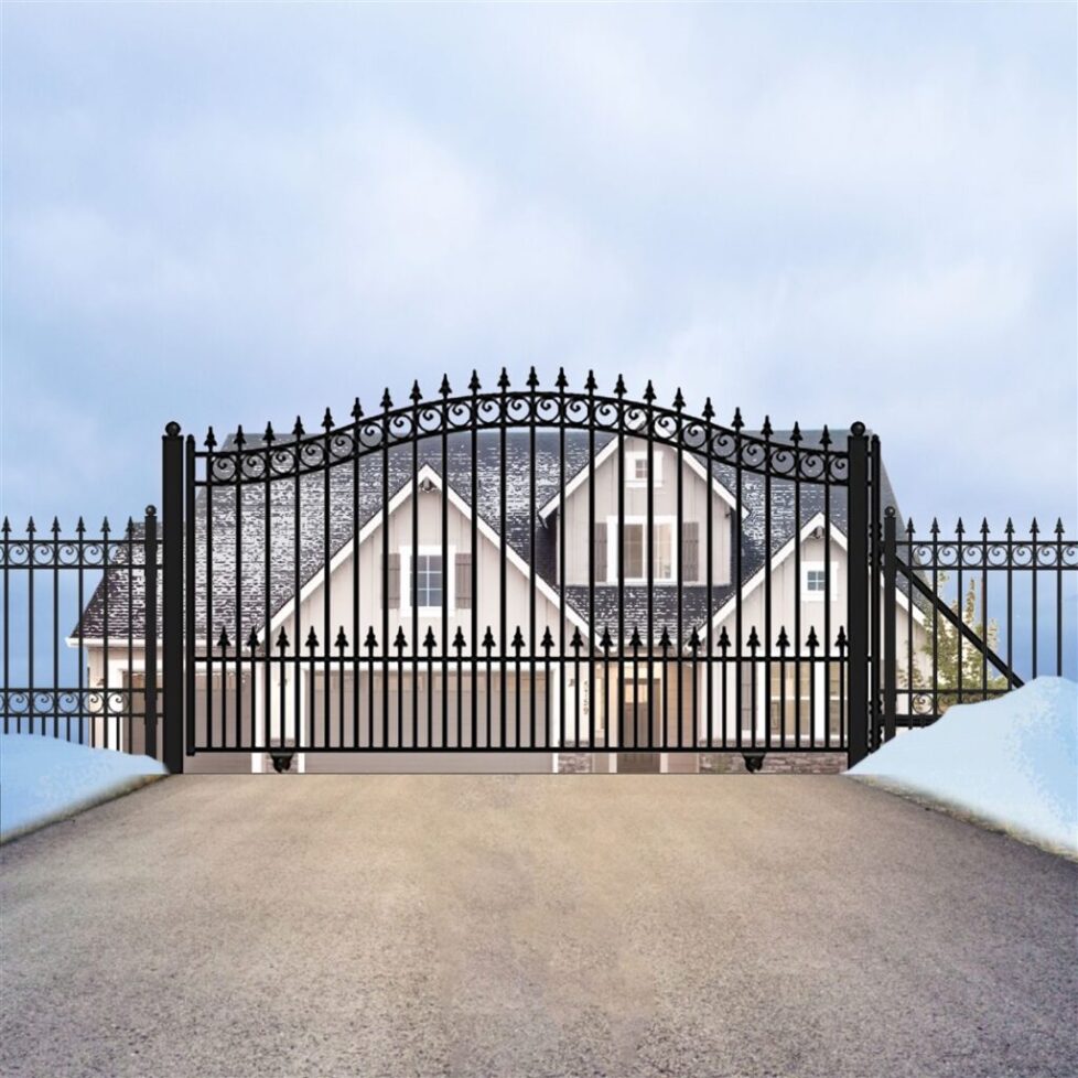 A large gate that is open on the side of a road.